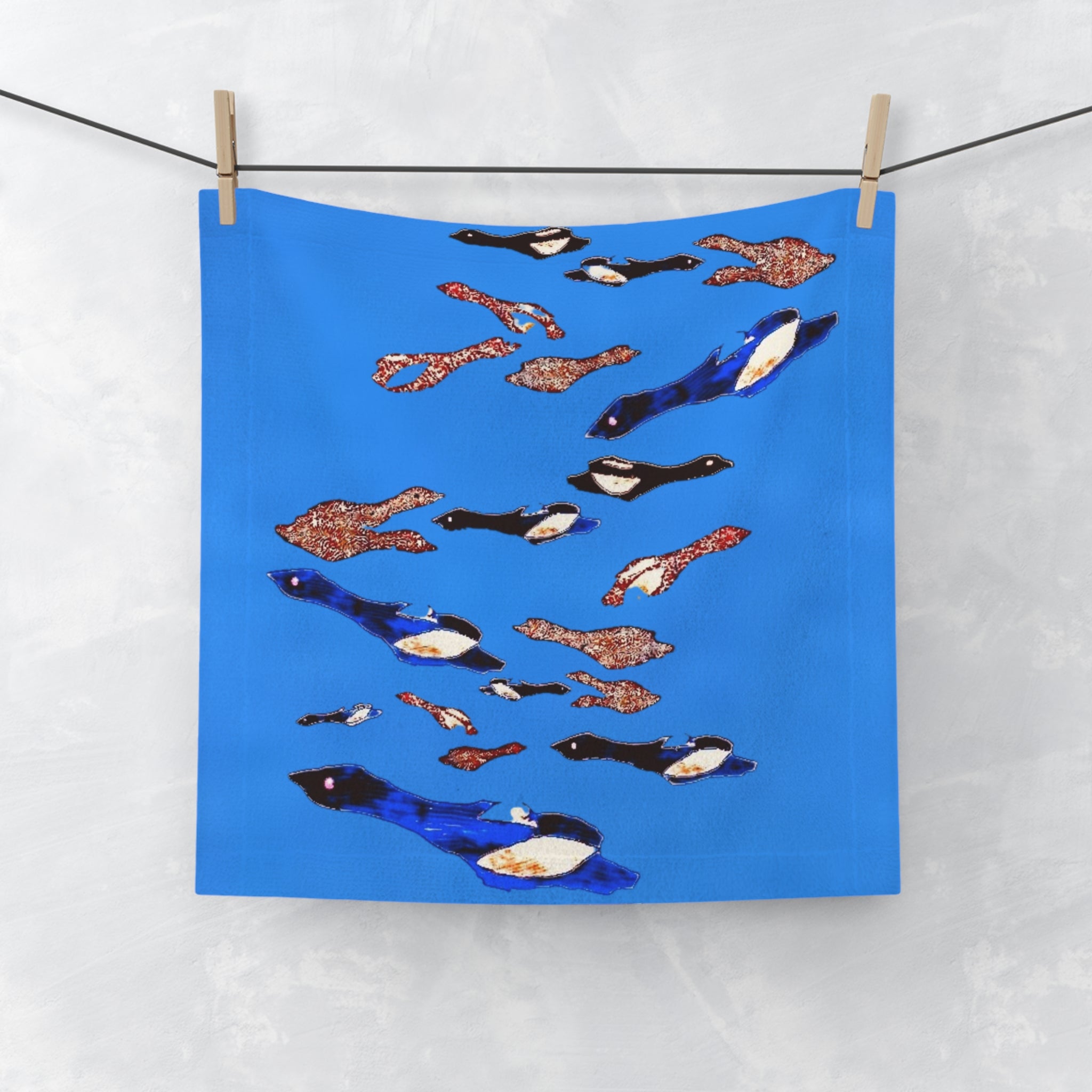 "Fly Me To The Moon" Penguin Swim Face Towel — Colorful School of Penguins on Bright Blue